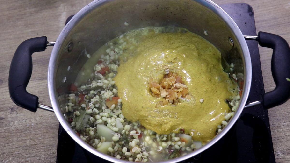 addition of coconut masala to make mooga gathi.