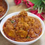 chicken changezi served in a white bowl.