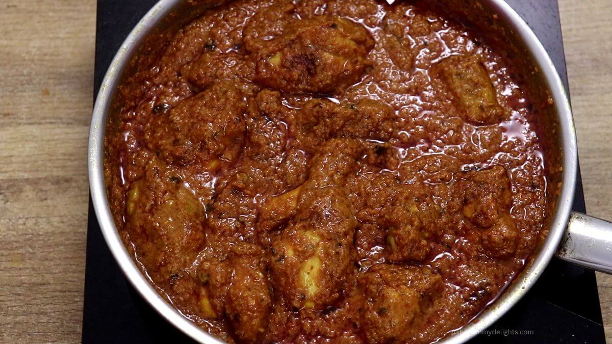 chicken changezi curry in a pan.