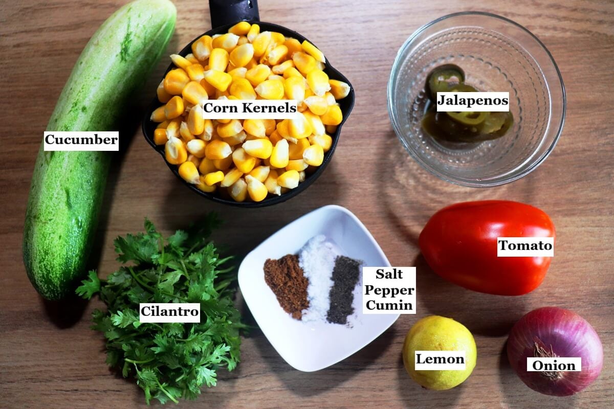 individually labelled ingredients to make corn salsa laid on the table.