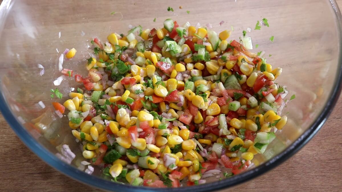 Fresh summer corn salsa made with sweet corn and vegetables.