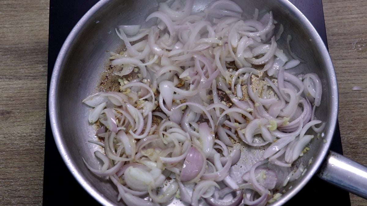 Garlic and onions sautéing in oil.