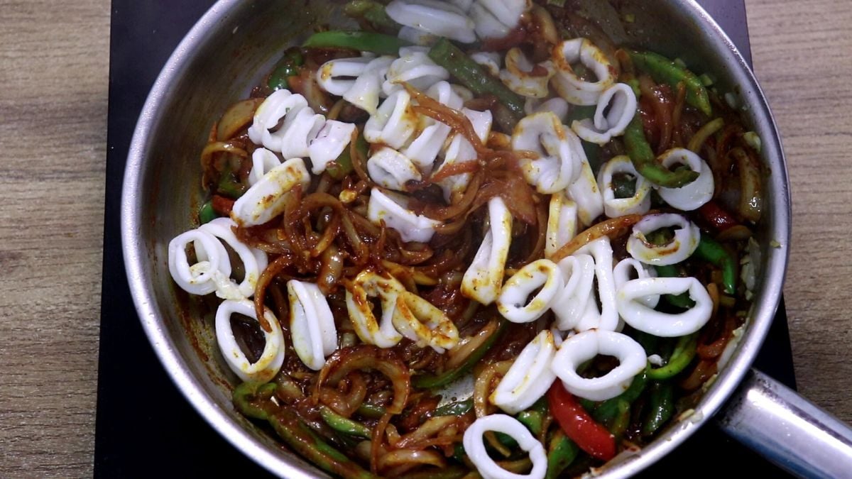 Squid mixed with spicy chilli fry masala.