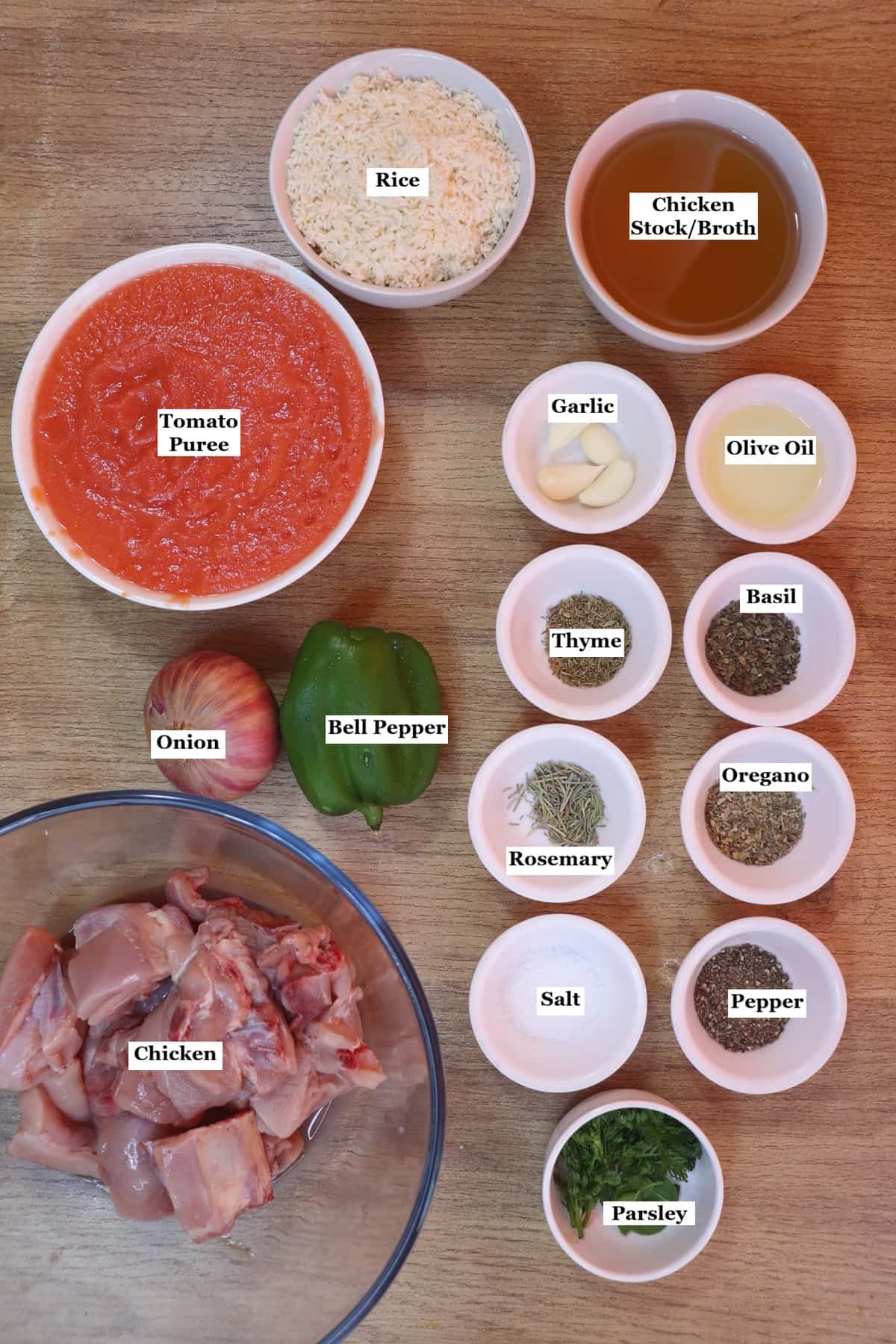 individually labelled ingredients to make tomato chicken and rice.