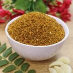 chutney powder karnataka style in a white bowl.