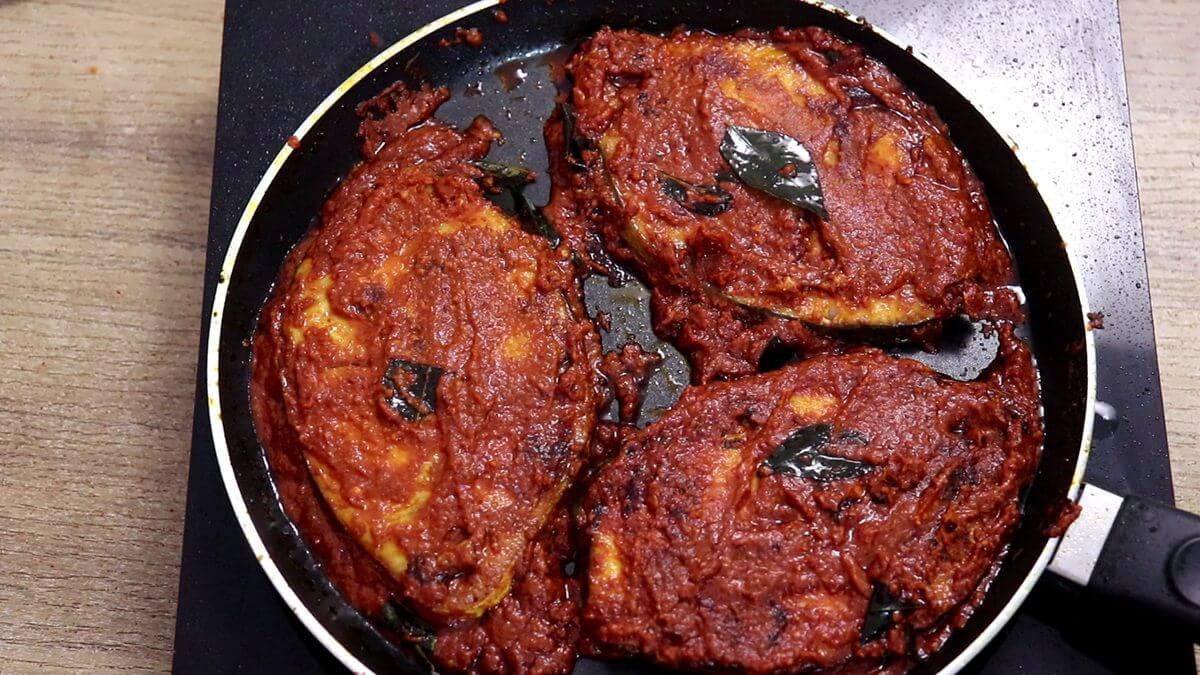 fish masala fry in a tawa, ready to serve.