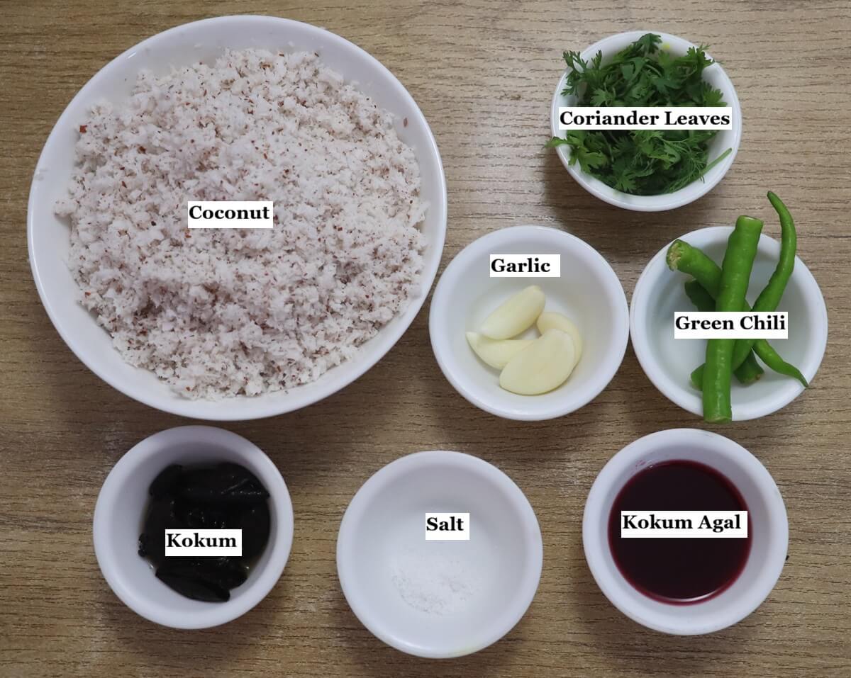 individually labelled ingredients to make solkadhi recipe are laid out on a table.