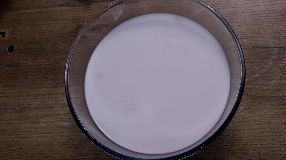 coconut milk for making solkadhi in a glass bowl.