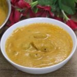 torachi uddamethi served in a white bowl.