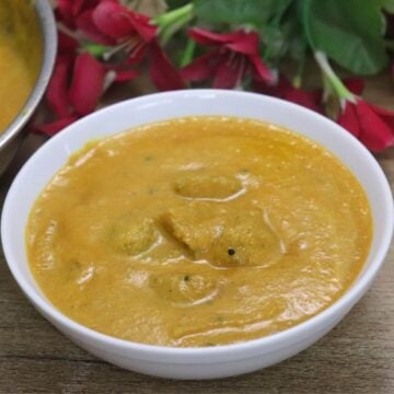 torachi uddamethi served in a white bowl.