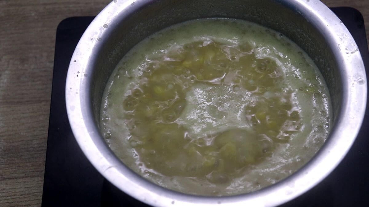 cooked mangane after the addition of second coconut milk.