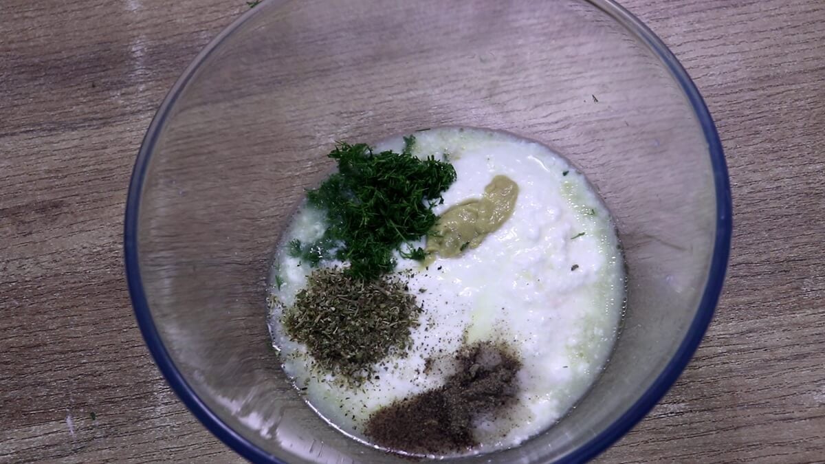 mixing salad dressing ingredients to make chicken mayo salad recipe.