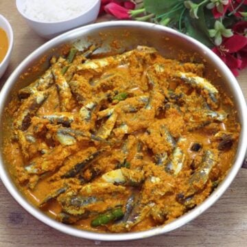 Fish sukka cooked in a pan with thick coconut masala.