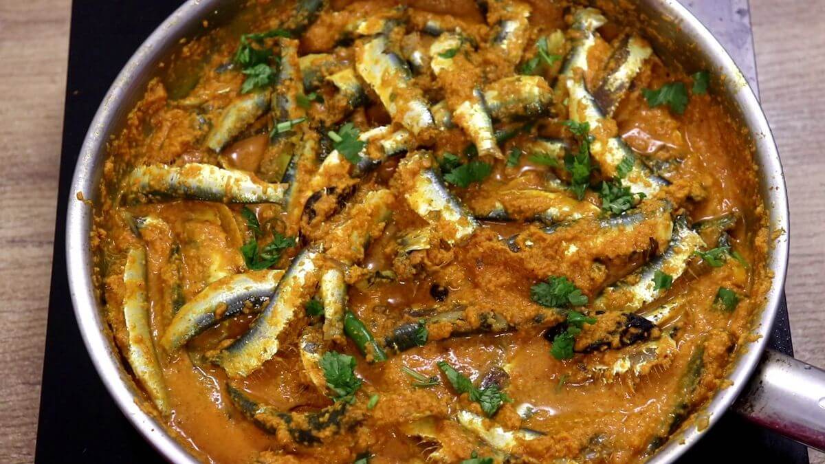 Traditional fish sukka garnished with fresh coriander leaves.
