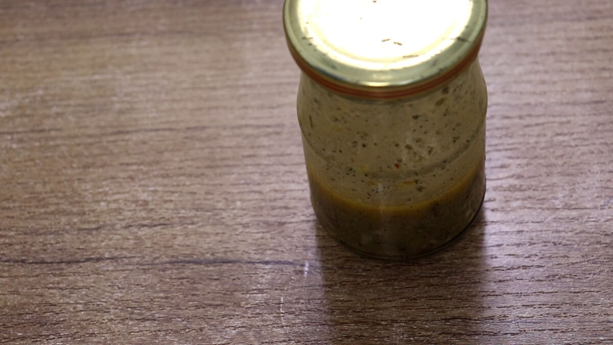 grilled chicken avocado salad dressing in a mason jar.