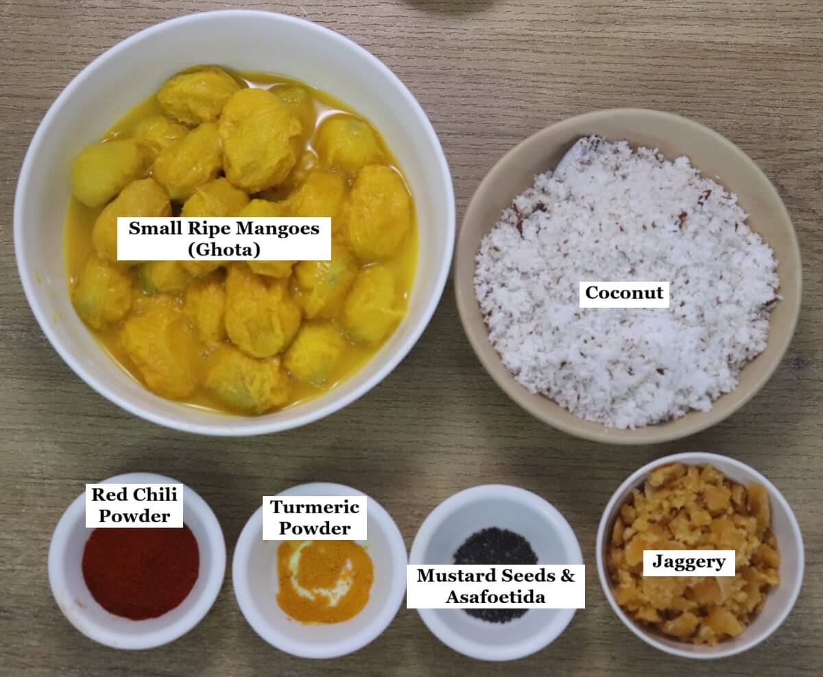 individually labelled ingredients to make mango sasav are laid out on a table.