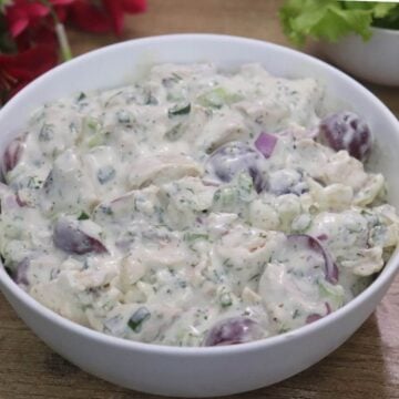 Mediterranean Greek yogurt chicken salad made without mayo with chicken, apples, grapes, and herbs.