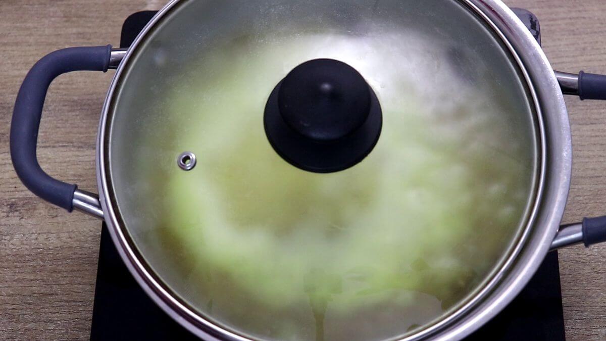 Cover and cook Mediterranean yellow rice on the stovetop.
