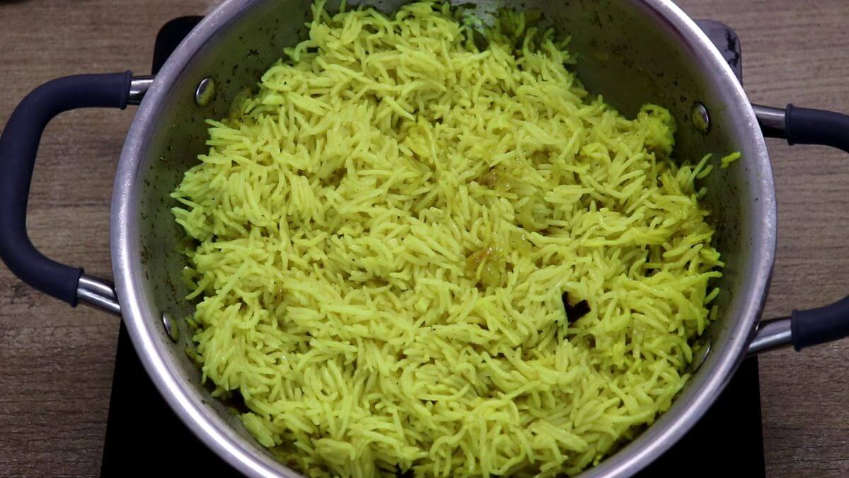 Cooked Mediterranean yellow rice with separate fluffy grains.