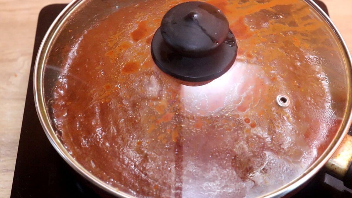 Ghee roast masala simmering until thick and well combined.