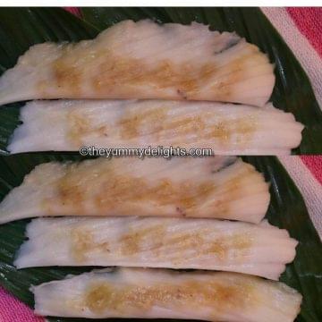 close-up of 5 patoli served on turmeric leaves.